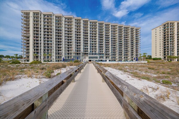 Stroll along the boardwalk to the beach at Phoenix VI and get ready for a beach day