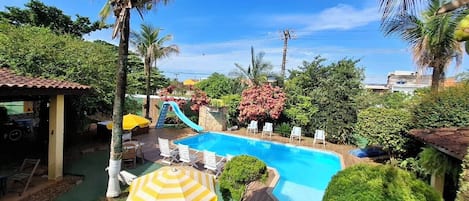 Outdoor pool, pool umbrellas, pool loungers