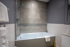 Shower, free toiletries, hair dryer, towels