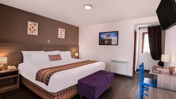 Deluxe Room, City View | Premium bedding, memory-foam beds, in-room safe, desk