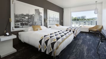 Premium bedding, down comforters, pillowtop beds, minibar