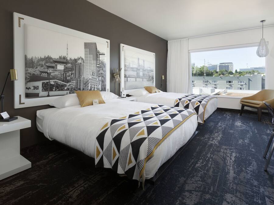 Premium bedding, down comforters, pillowtop beds, minibar
