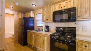 Cottage, 2 Bedrooms (No linens provided) | Private kitchen | Full-size fridge, microwave, oven, stovetop