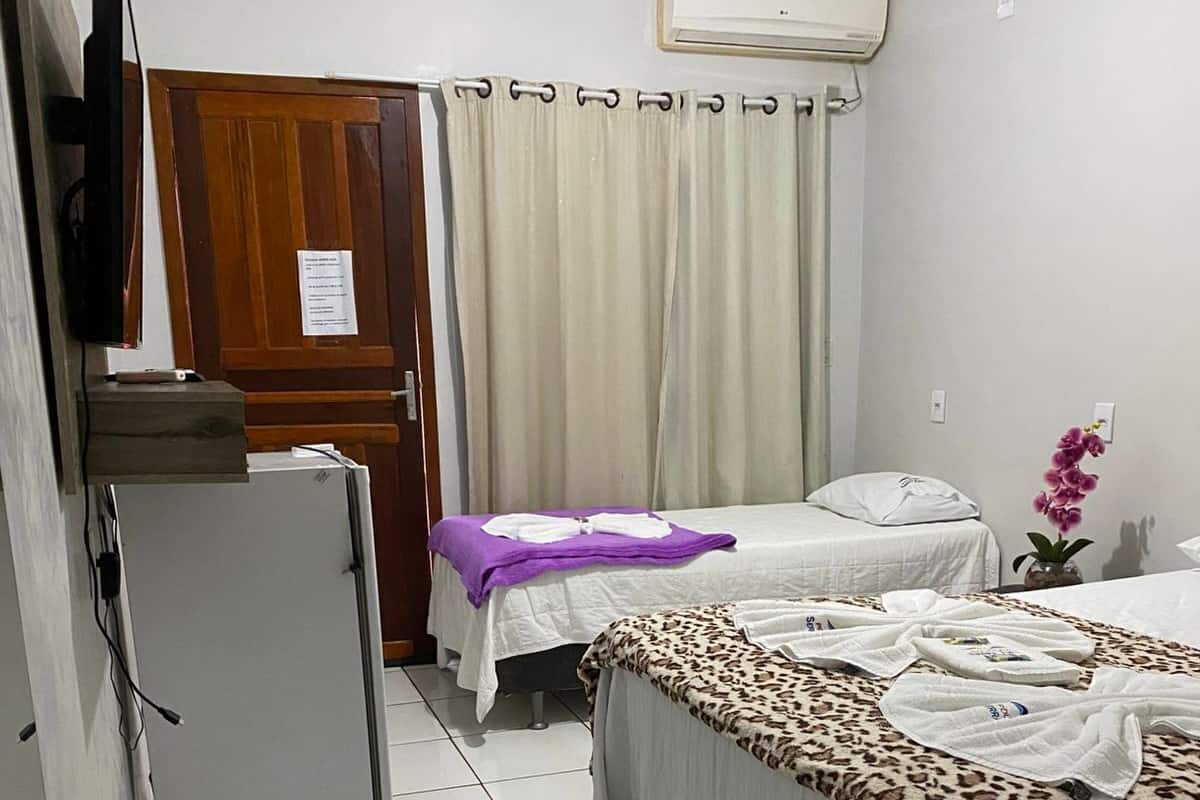 Driepersoonskamer | 1 slaapkamer, een minibar, verduisterende gordijnen, gratis wifi