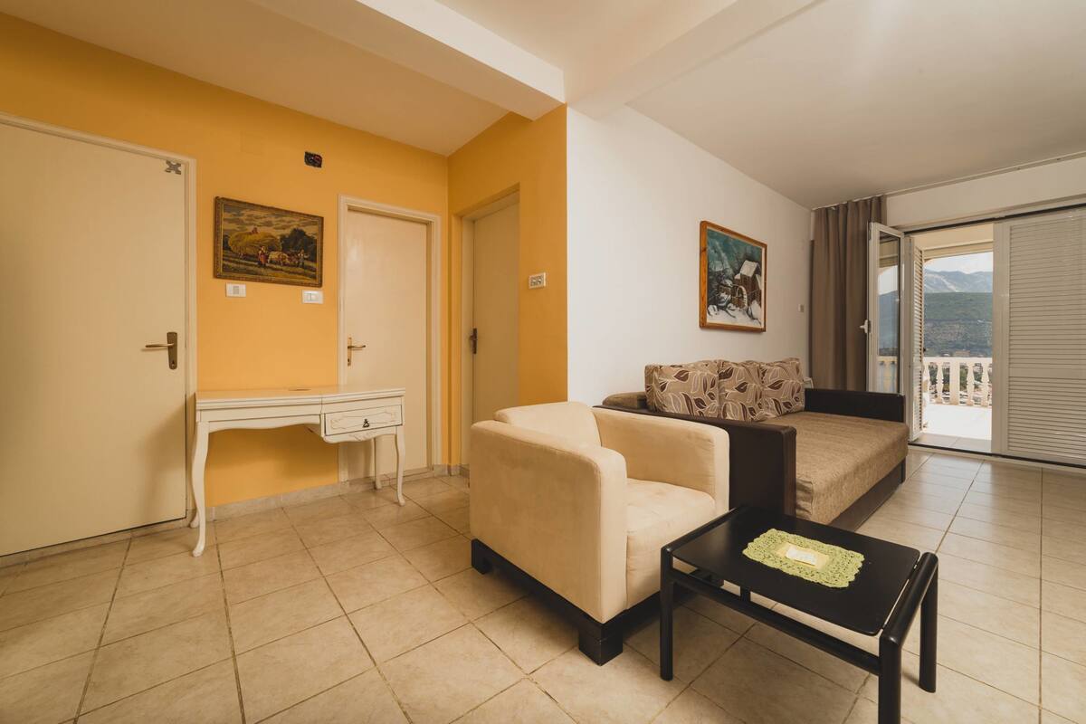 Deluxe Apartment, 1 Bedroom, Sea View | 1 bedroom, desk, iron/ironing board, free WiFi