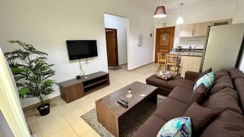 Two Bedroom Apartment Back View | Living area | 32-inch LCD TV with satellite channels