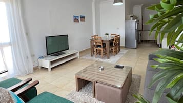 Superior Two-Bedroom Apartment with Sea | Living area | 32-inch LCD TV with satellite channels
