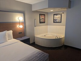 Deluxe Studio Suite, 1 King Bed, Non Smoking | Desk, laptop workspace, blackout drapes, iron/ironing board