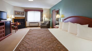 Studio Suite, 1 King Bed, Non Smoking | Desk, laptop workspace, blackout drapes, iron/ironing board