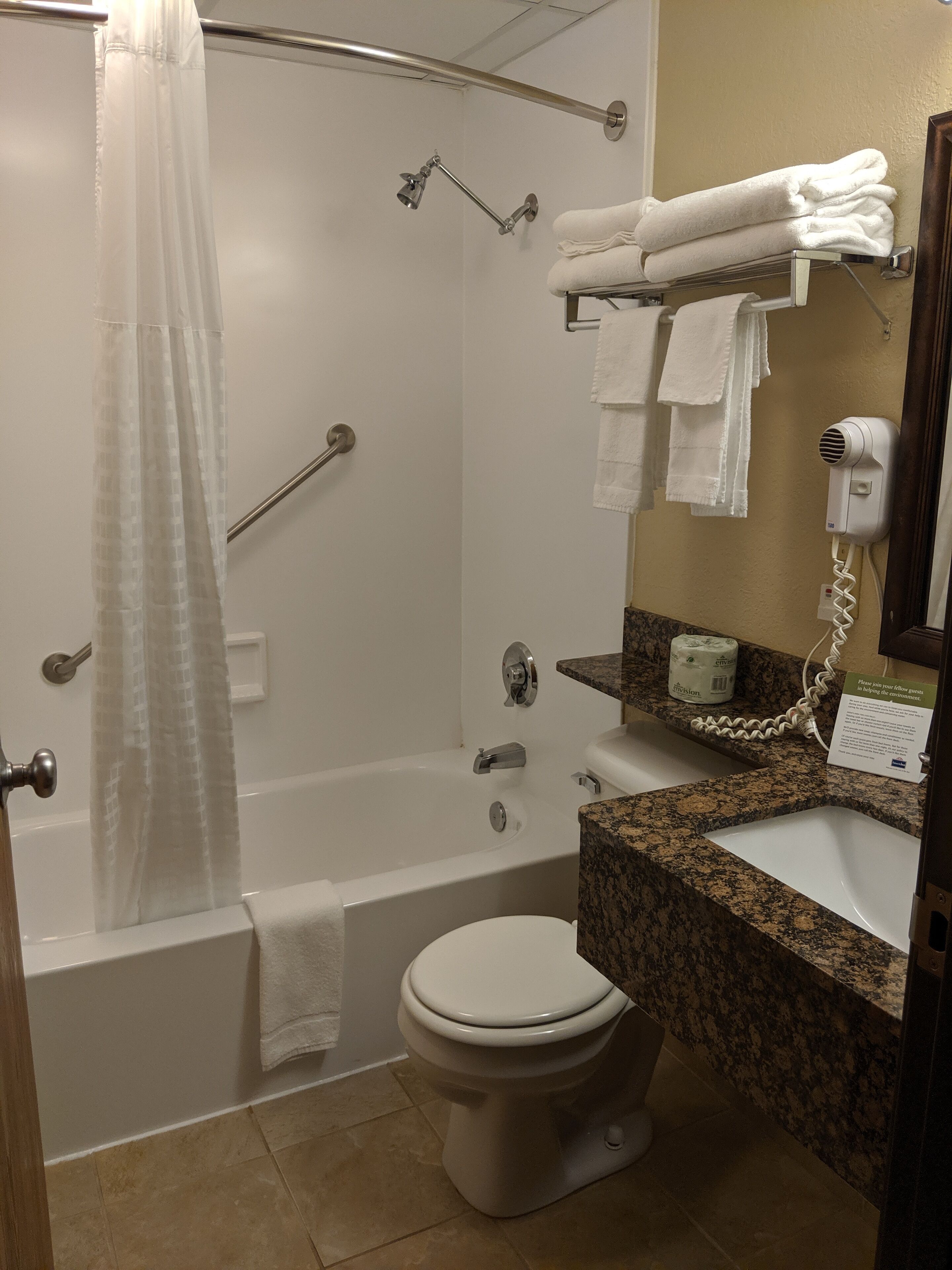 combined shower/bathtub, free toiletries, hair dryer, towels
