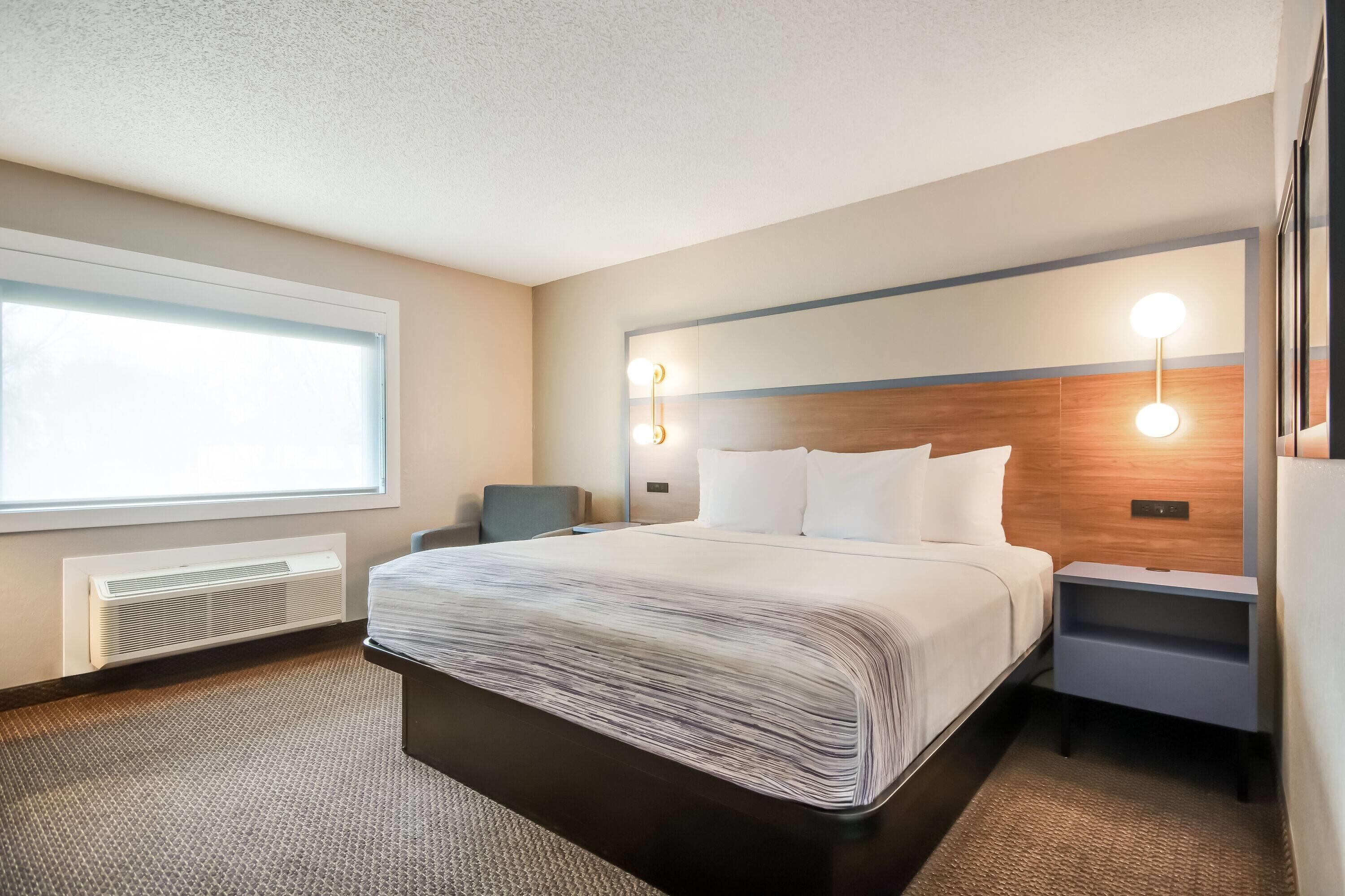 Room, 1 King Bed, Non Smoking | Desk, laptop workspace, blackout drapes, iron/ironing board