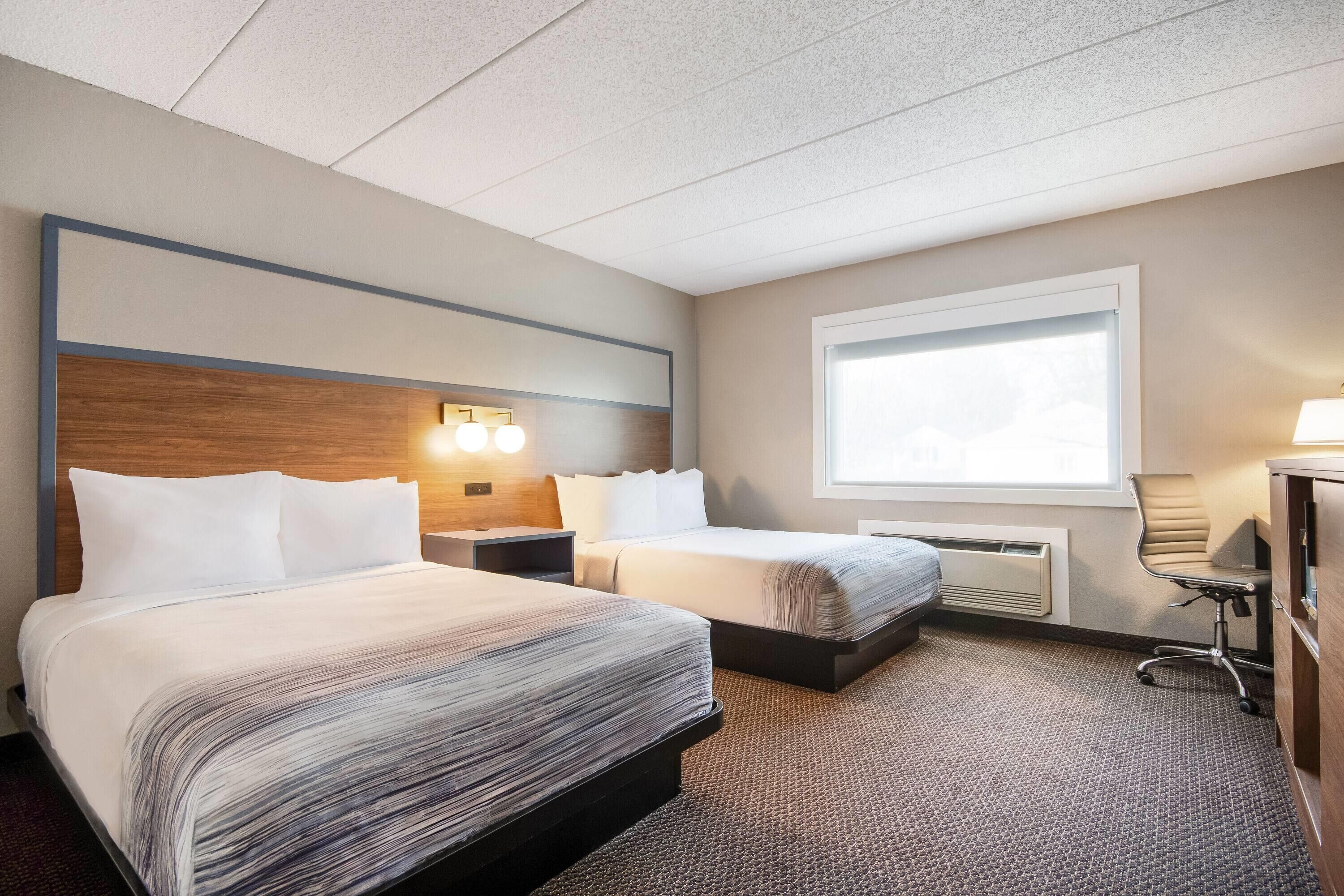 Room, 2 Double Beds, Accessible, Non Smoking | Desk, laptop workspace, blackout drapes, iron/ironing board