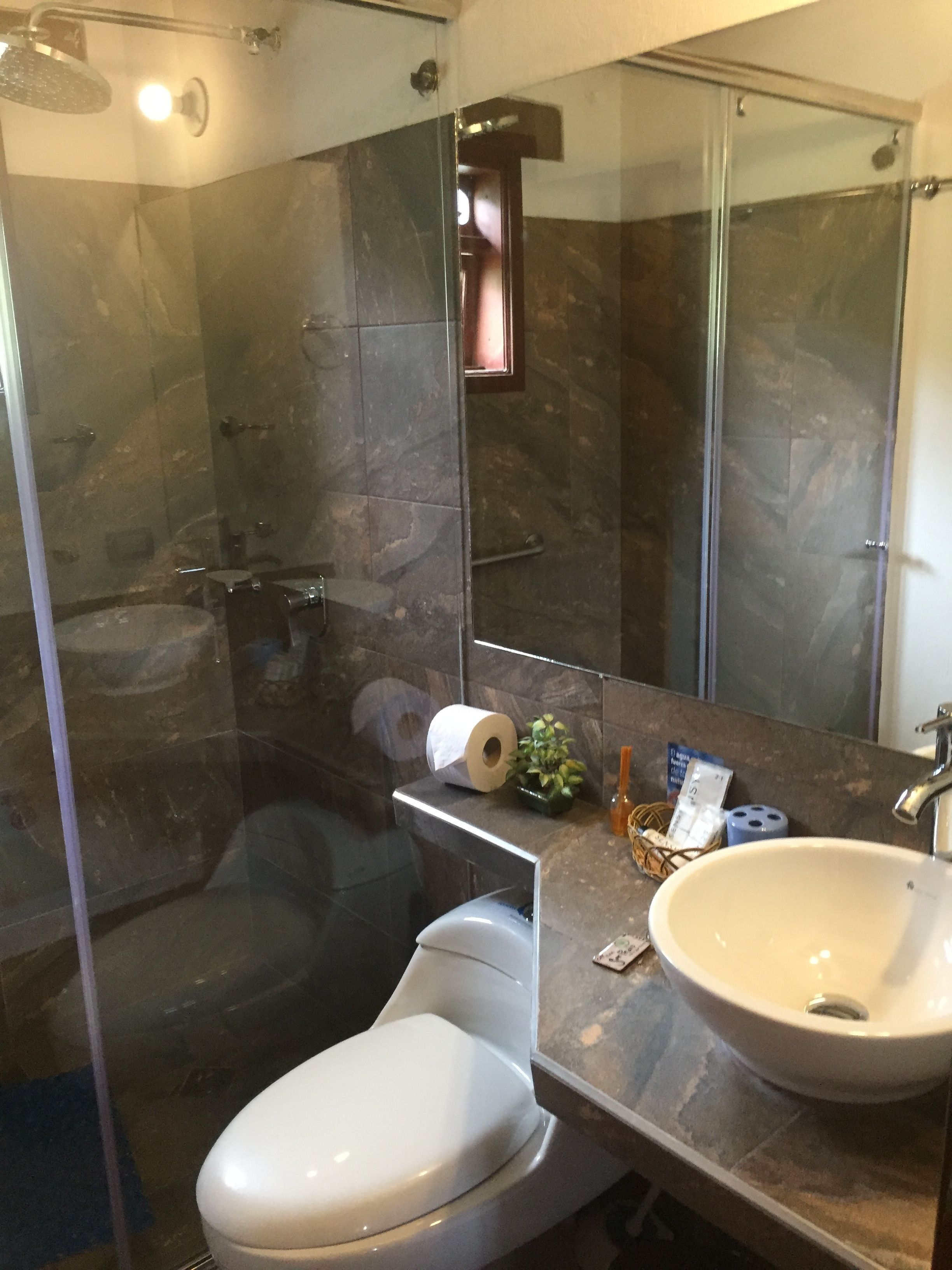 designer toiletries, hair dryer, heated floors, towels