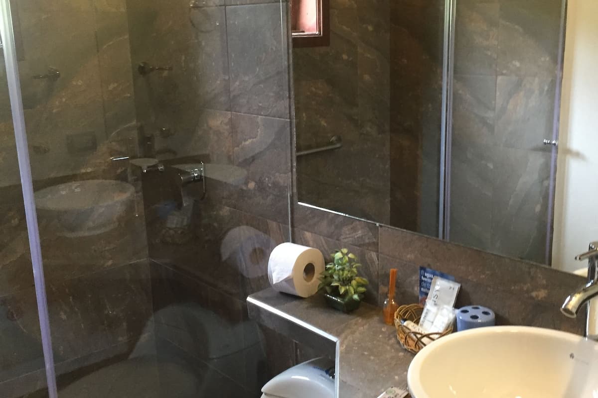 designer toiletries, hair dryer, heated floors, towels