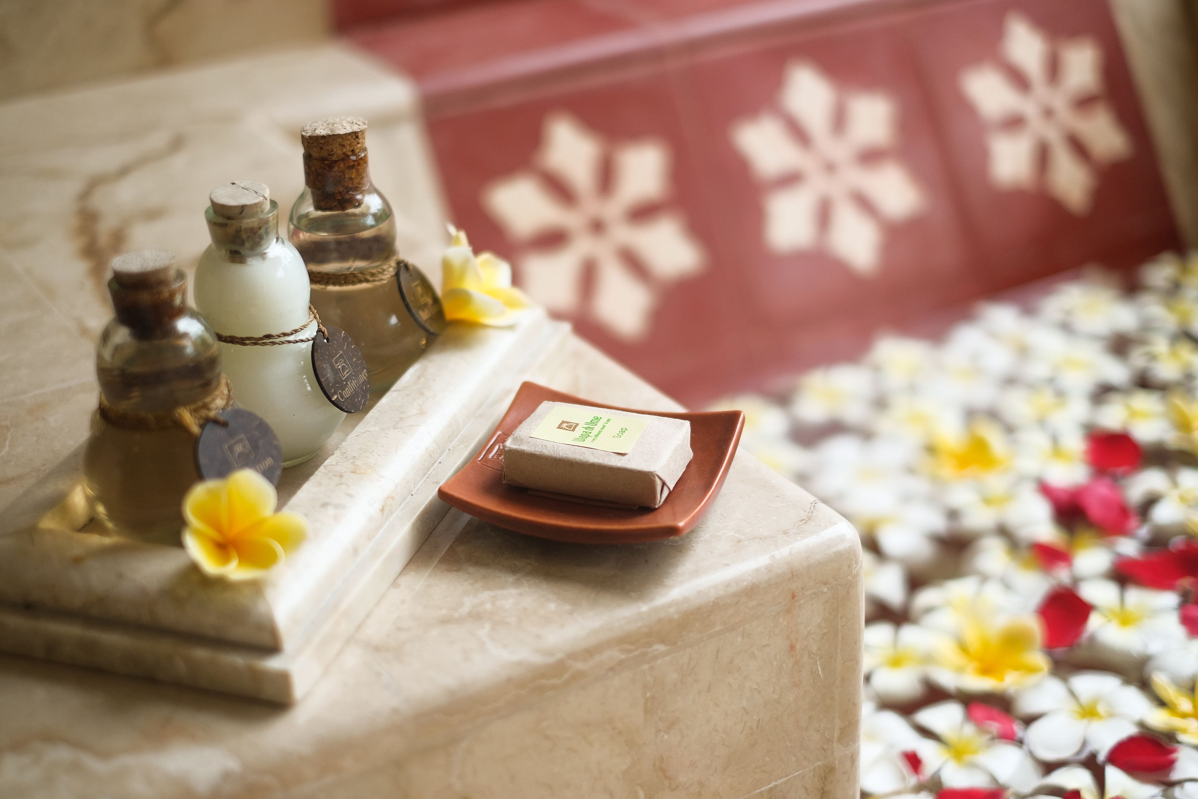 separate bathtub and shower, deep-soaking bathtub, designer toiletries