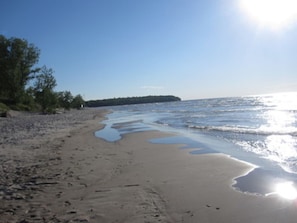 On the beach, sun-loungers, beach towels