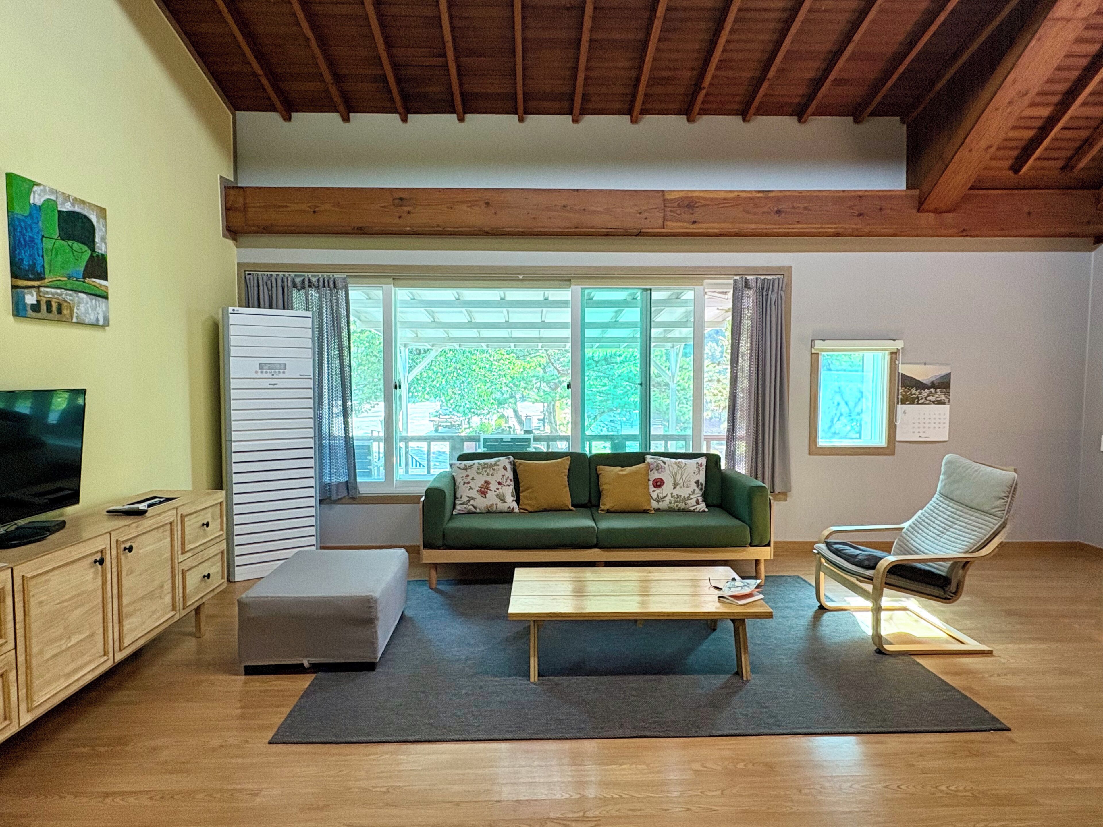 Penthouse (B) | Living area | 32-inch flat-screen TV with cable channels, Netflix, heated floors