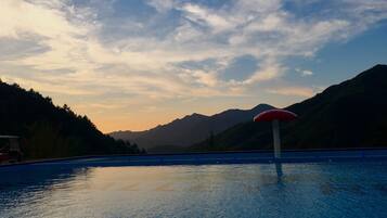 Seasonal outdoor pool, pool umbrellas, sun loungers