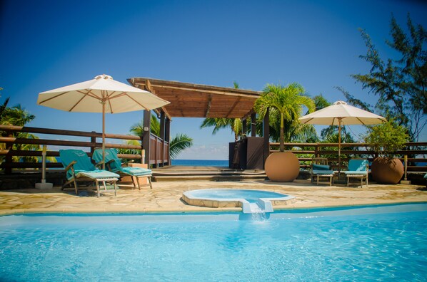 Outdoor pool, pool umbrellas, pool loungers