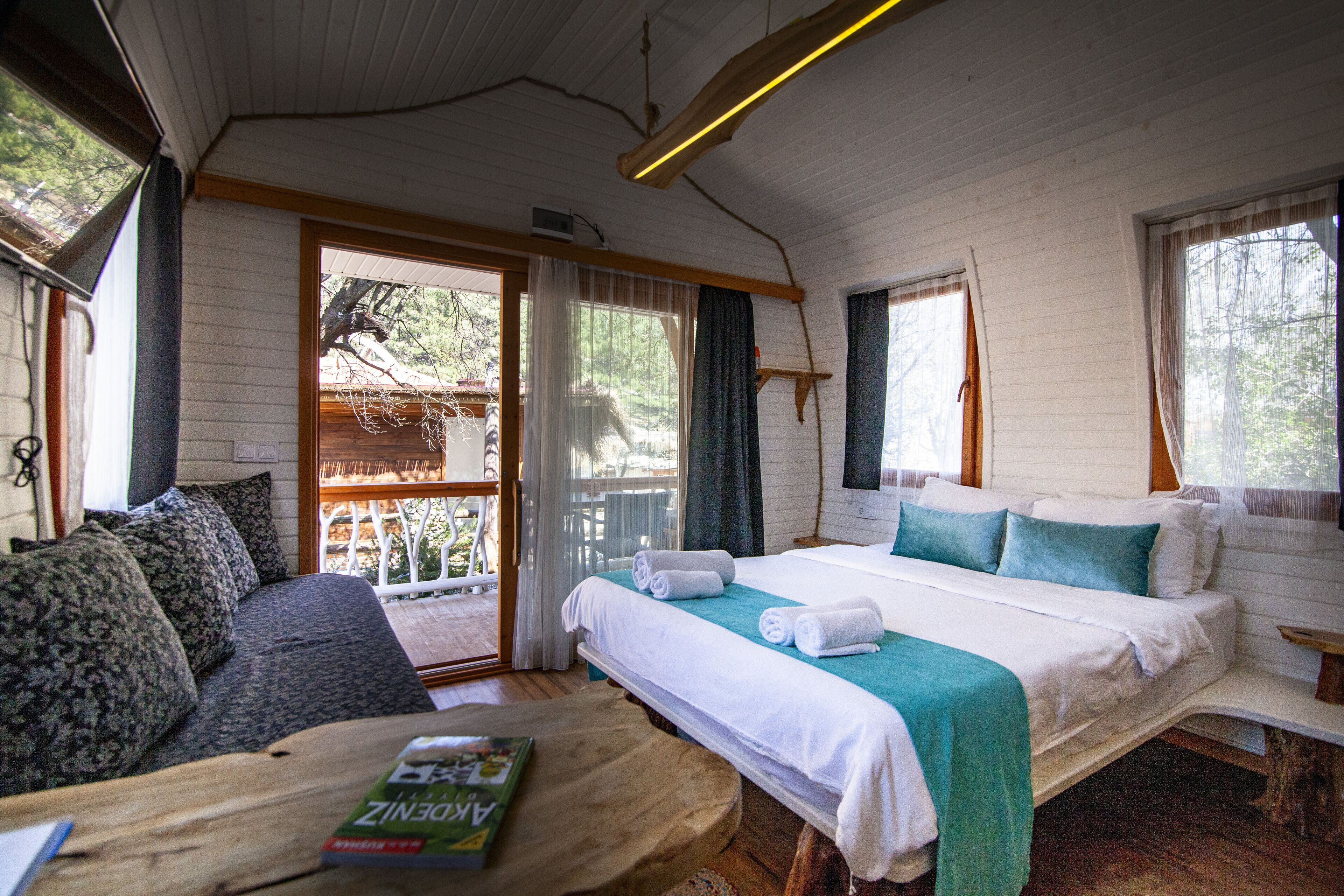 design cabin, 1 queen bed, non smoking, courtyard view | soundproofing, iron/ironing board, free wifi, bed sheets