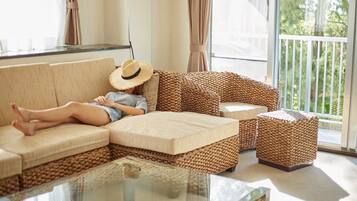 SCALLOP (Beach Apartment) Room C | Living area | Flat-screen TV