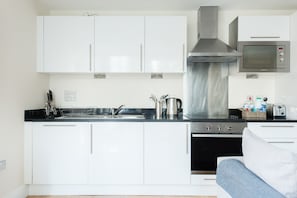 Lägenhet Classic - 2 sovrum | Eget kök | Kylskåp, mikrovågsugn, ugn och spishäll