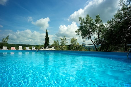 Seasonal outdoor pool, pool umbrellas, sun loungers