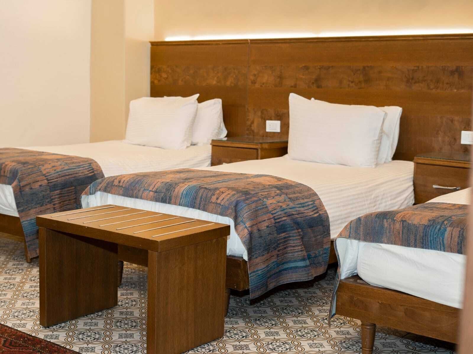 standard triple room | in-room safe, desk, iron/ironing board, free cots/infant beds