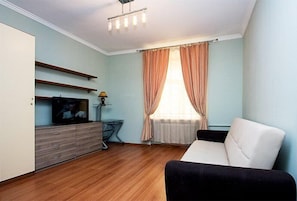 Premium bedding, blackout curtains, soundproofing, iron/ironing board