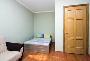 Premium bedding, blackout curtains, soundproofing, iron/ironing board