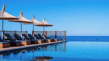 Seasonal outdoor pool, open 9:00 AM to 7:30 PM, free pool cabanas