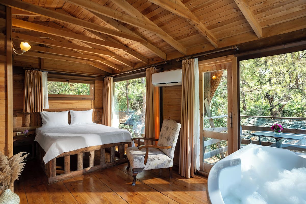 Superior boomhut | 1 slaapkamer, Select Comfort-bedden, een minibar