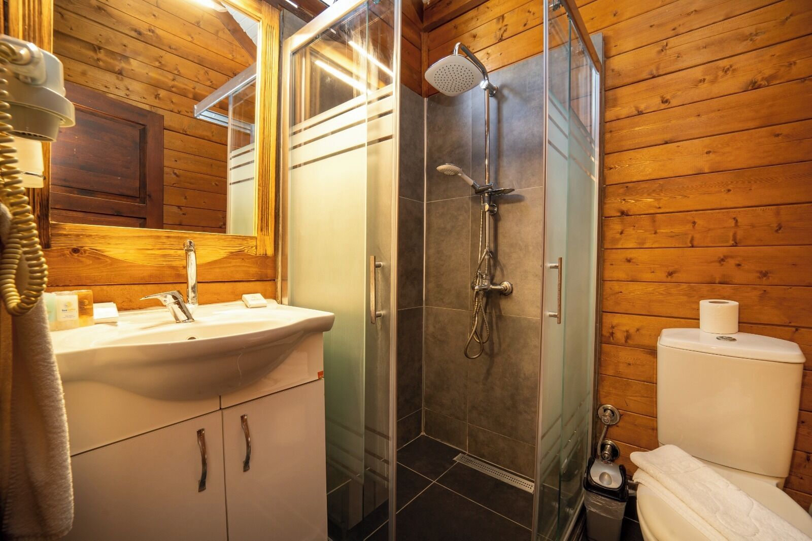 olive bungalow | bathroom | shower, rainfall showerhead, free toiletries, hair dryer