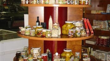 A multi-tiered display of various food items and condiments.