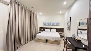 Premium bedding, in-room safe, soundproofing, iron/ironing board