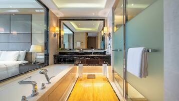 Separate tub and shower, free toiletries, hair dryer, bathrobes