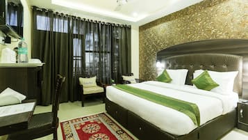 Deluxe Room | Desk, blackout curtains, iron/ironing board, rollaway beds