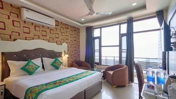 Premium Room | Desk, blackout drapes, iron/ironing board, rollaway beds