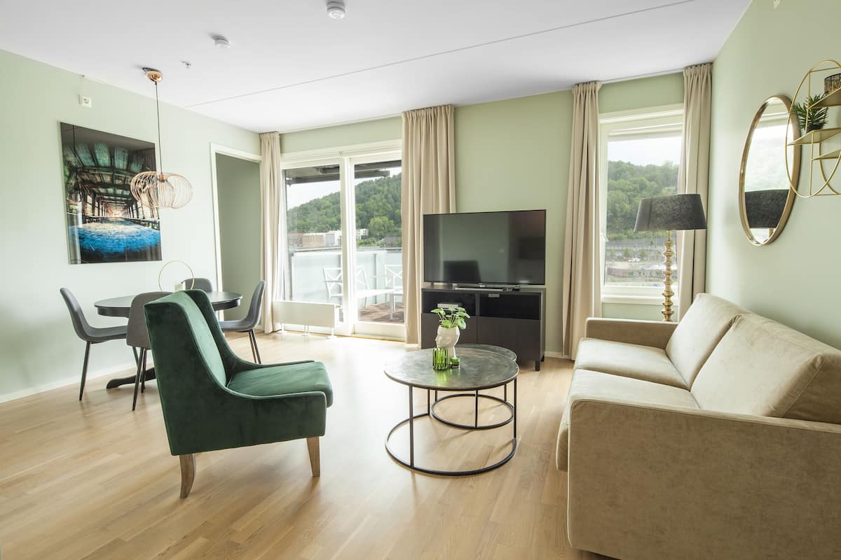 Apartment, 1 Bedroom | Living area | Flat-screen TV