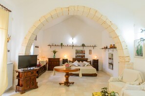 Studio, Garden View (Fienile) | Living area | Flat-screen TV, fireplace, table football, ping pong - Masseria Pozzo Tre Pile  (Martina Franca)