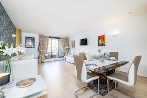 Apartment, 2 Bedrooms | Living room | TV, DVD player