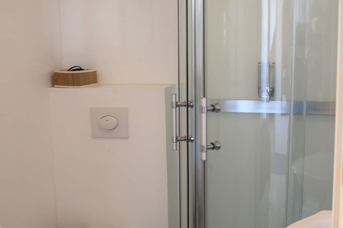 family room | bathroom | shower, free toiletries, hair dryer, towels