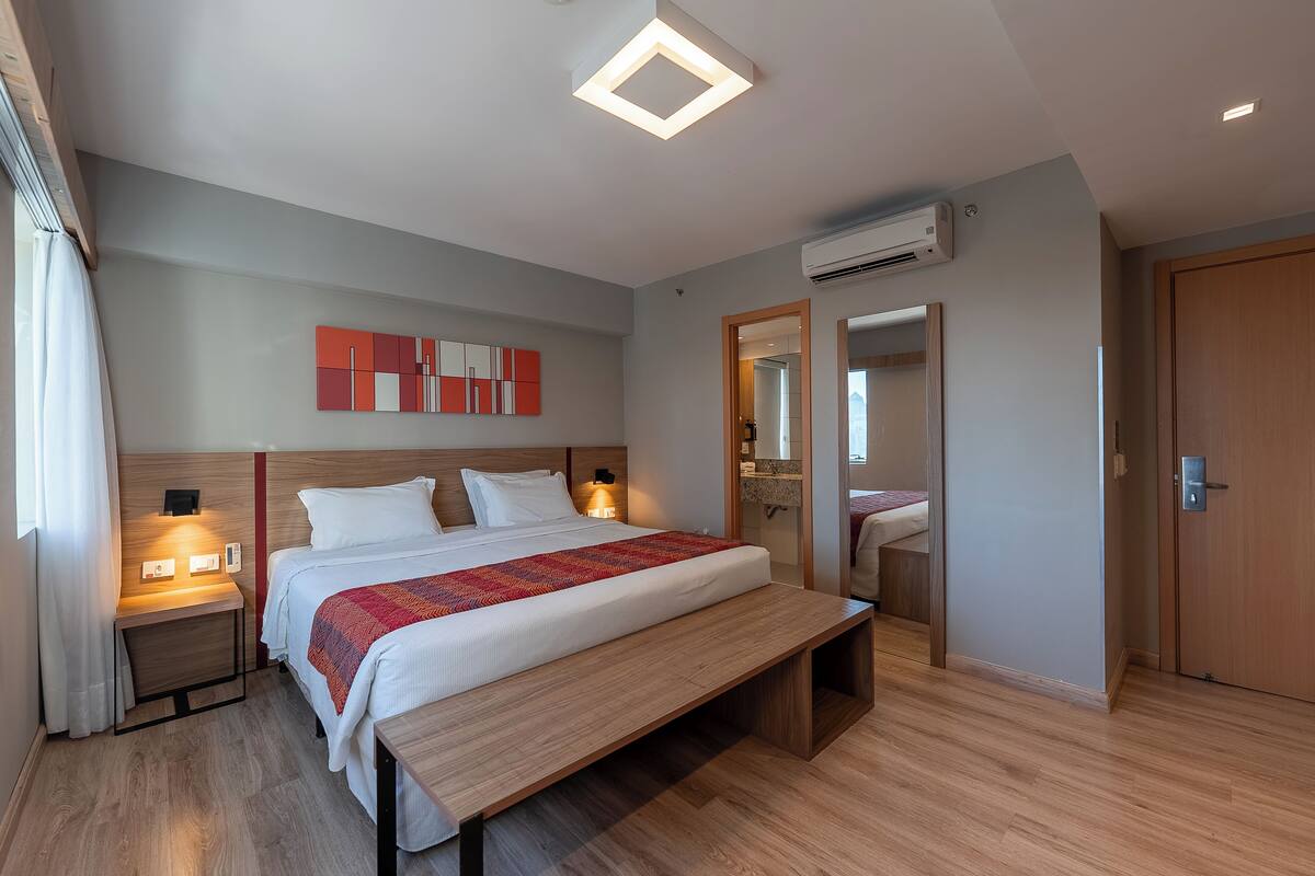 superior room | in-room safe, desk, laptop workspace, blackout curtains