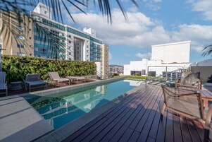 Outdoor pool, open 11:00 AM to 9:00 PM, pool umbrellas, sun loungers