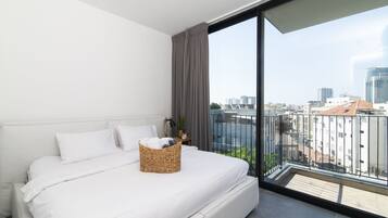 Laptop workspace, blackout curtains, iron/ironing board