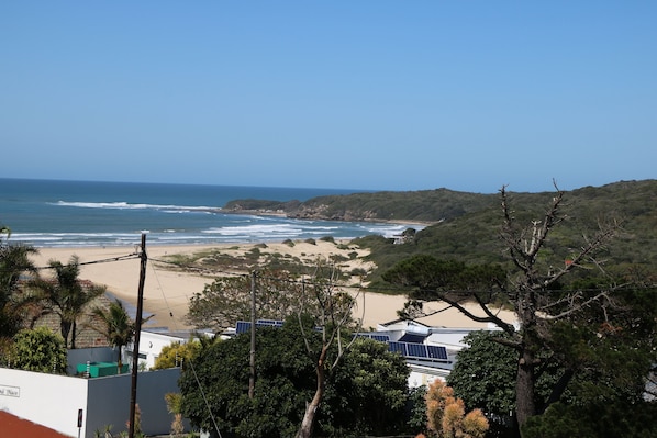Enjoy the serene ocean views and sandy beach.