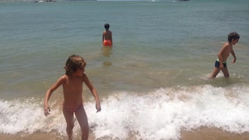 Na praia, prática de mergulho autônomo