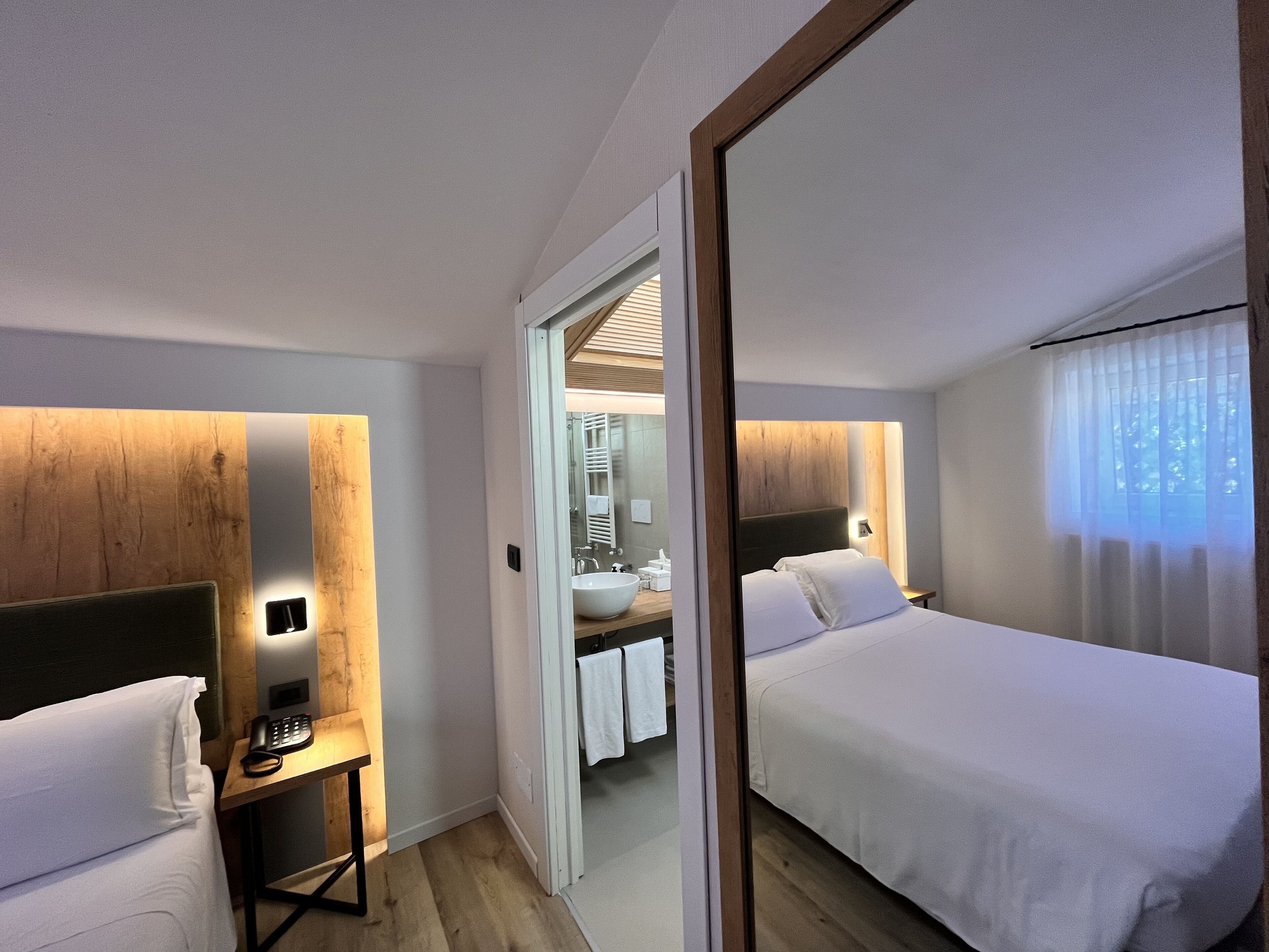 classic double or twin room, balcony, city view | down duvets, minibar, in-room safe, individually decorated