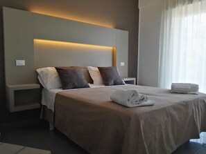 In-room safe, desk, laptop workspace, blackout drapes