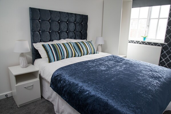 Desk, iron/ironing board, cots/infant beds, rollaway beds